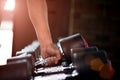 Close up muscular arm. Man hand holding dumbbell Royalty Free Stock Photo