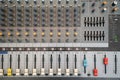 Sound technician audio mixer equalizer control for background.