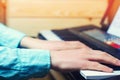 Close-up of a music performer`s hand playing the piano, man`s hand, classical music, keyboard, synthesizer, pianist Royalty Free Stock Photo