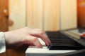 Close-up of a music performer`s hand playing the piano, man`s hand, classical music, keyboard, synthesizer, pianist Royalty Free Stock Photo