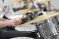 A close up of musician& x27;s hands. Drum kit playing. Royalty Free Stock Photo