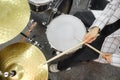 A close up of musician& x27;s hands. Drum kit playing.