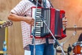 Close up musicians are playing accordion on stage Royalty Free Stock Photo
