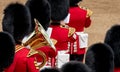 Massed band at the Trooping the Colour parade at Horse Guards, London UK, with reflection in the trumpet. Royalty Free Stock Photo