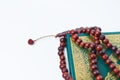 Close up Muslim Rosary beads, tasbih on a holy quran Royalty Free Stock Photo