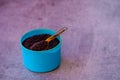 Close up of mustard seeds/Rai or brown mustard seeds in a small bowl on background, selective focus Royalty Free Stock Photo