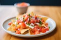 close-up of nachos with fresh pico de gallo