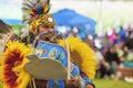 Close up of Native American at a PowWow holding a Papoose Cradleb Royalty Free Stock Photo