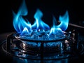 Close-up natural gas flame. Gas flame on dark background. Blue flames Royalty Free Stock Photo