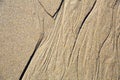 Close up of natural sand surface at the beach after low tide Royalty Free Stock Photo