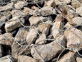 Close up natural stones in retain a wire mesh