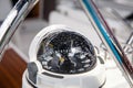 Close up of nautical compass on yacht Royalty Free Stock Photo