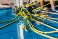 Close-up nautical knot rope tied around stake on boat or ship, boat mooring rope. Royalty Free Stock Photo