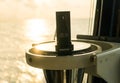 Close up of nautical marine magnetic compass on yacht or boat Royalty Free Stock Photo