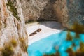 Close up of Navagio beach called Shipwreck bay. Turquoise water and pebble white beach and limestone walls. Famous