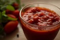 Close up of Neapolitan tradition tomato sauce for pasta or pizza in a glass bowl on a wooden background. Royalty Free Stock Photo