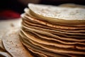 close-up of a neatly stacked pile of fresh tortillas