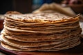 close-up of a neatly stacked pile of fresh tortillas