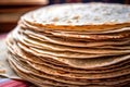 close-up of a neatly stacked pile of fresh tortillas