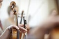 Close-up of the neck of a violin with a bow