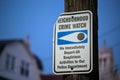 Close up of neighborhood watch sign on telephone pole Royalty Free Stock Photo