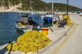 Dock nets and fishing boats in the port of frikes ithaka Royalty Free Stock Photo