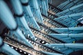 close up of network cables connected to server racks in data center room