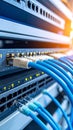 Close-up of network server rack with connected cables and data transfer lights. Royalty Free Stock Photo