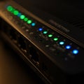 Close-up of a network switch or router showing illuminated LED indicator lights in Royalty Free Stock Photo