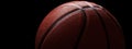 Close-up of new basketball ball on black background