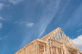 Close-up new build gables roof wooden truss, post, beam framework
