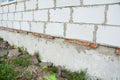 Close up on new building house construction foundation wall waterproofing. Properly insulated basement wall can save you money