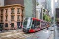 Close up of new Light Rail tram travelling along George Street in central Sydney, Australia