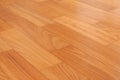Close-up of new linoleum with parquet pattern, background Royalty Free Stock Photo