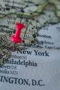 Close up of New York pin pointed on the world map with a pink pushpin Royalty Free Stock Photo