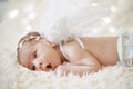 close up. newborn baby angel falling asleep.