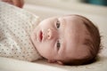 Close Up Of Newborn Baby Boy Lying On Changing Table In Nursery Royalty Free Stock Photo
