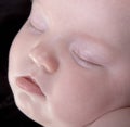 Close-up of a newborn baby face Royalty Free Stock Photo