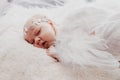 Close up on newborn baby girl, angel wings Royalty Free Stock Photo