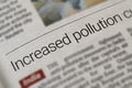 Close-Up of Newspaper Headline \'Increased Pollution\' Highlighting Environmental Crisis and Media Coverage Royalty Free Stock Photo