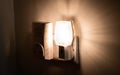 Close up of a night light plugged into a wall in a house Royalty Free Stock Photo