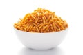 Close up of Nimbu masala besan sev Indian namkeen snacks on a ceramic white bowl.