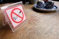 no smoking warning on table in coffee shop