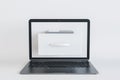 Close up of notebook computer with abstract document folder coming out of screen on white background. Computing, digital,