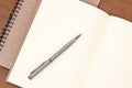 Close-up notebook or note book diary with a pen or pencil on top view desk Royalty Free Stock Photo