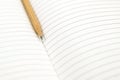 Close-up notebook or note book diary with a pen or pencil on top view desk Royalty Free Stock Photo