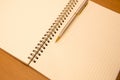 Close-up notebook or note book diary with a pen or pencil on top view desk Royalty Free Stock Photo