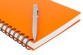 Close up notebook spiral bound and pen on white background Royalty Free Stock Photo