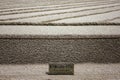 Close up of notification board which says please do not touch in Japanese zen garden sand layout in the Ginkakuji Temple Royalty Free Stock Photo