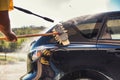 Close up of nozzle of high pressure washer used on car Royalty Free Stock Photo